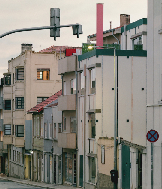Housing with Pink Chimneys by Fala Atelier. Photograph by Francisco Ascensão Housing with Pink Chimneys by Fala Atelier. Photograph by Francisco Ascensão