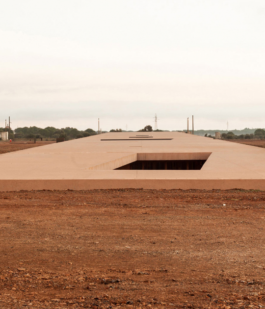 Exterior view. Memorial museum in Rivesaltes by Rudy Ricciotti + Passelac & Roques Architectes. Photgraphy © Kevin Dolmaire Exterior view. Memorial museum in Rivesaltes by Rudy Ricciotti + Passelac & Roques Architectes. Photgraphy © Kevin Dolmaire