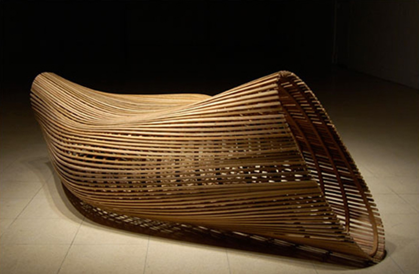 Courtesy Matthias Pliessnig. CONVOLUTION. Steam bent white oak, 88"x42"x31" (223 cm x 107 cm x 79 cm).2006