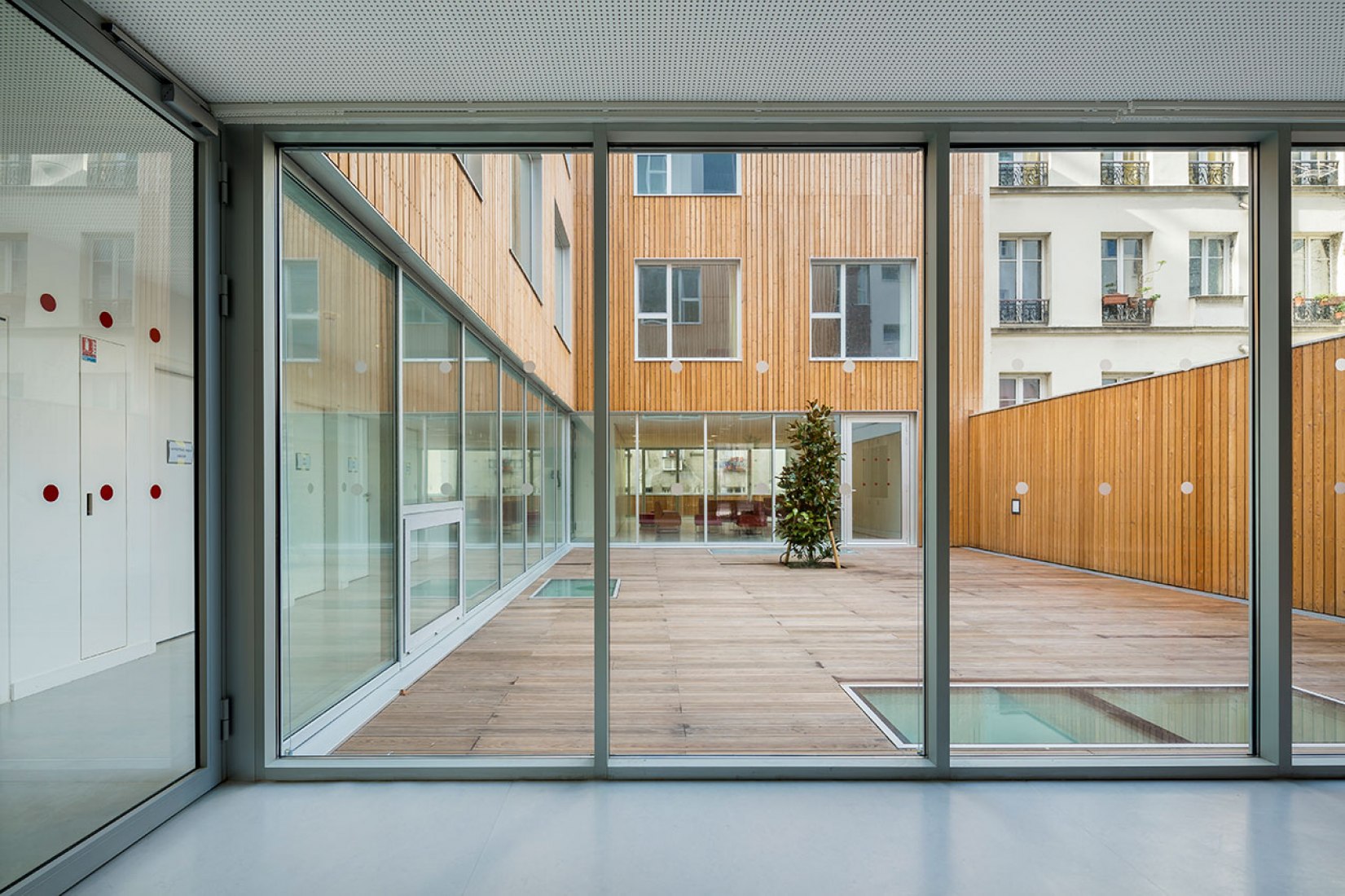 Interior view, courtyard. An urban health center by AZC. Photography © AZC & SERGIO GRAZIA