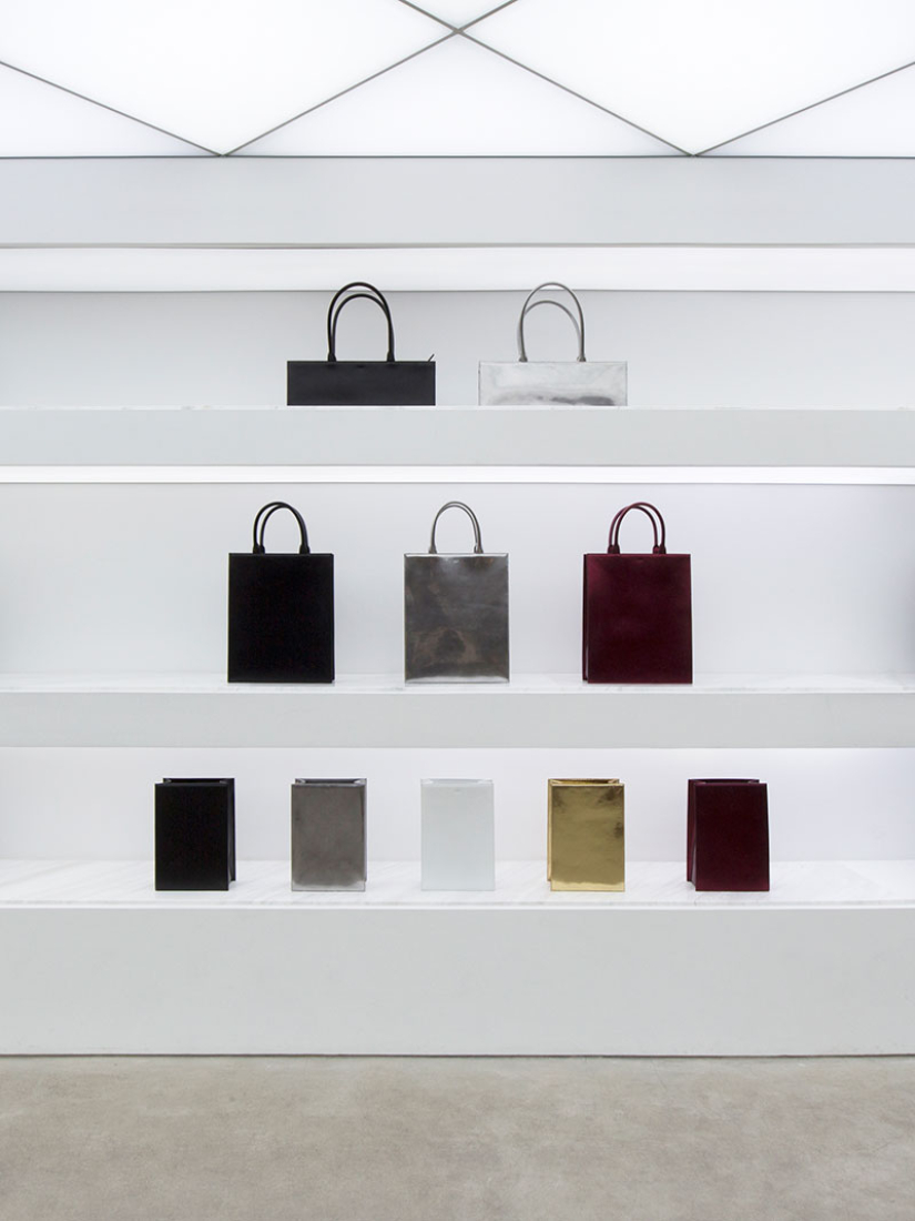 Shelves. Nicolas Andreas Taralis boutique by Bernard Dubois. Photography © Bernard Dubois.