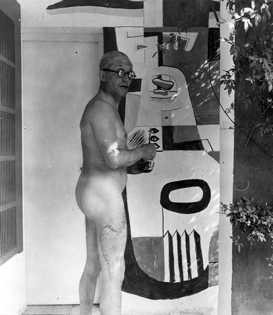 Le Corbusier at work on one of his murals for the villa in the mid-1920s.  Photograph: Unknown