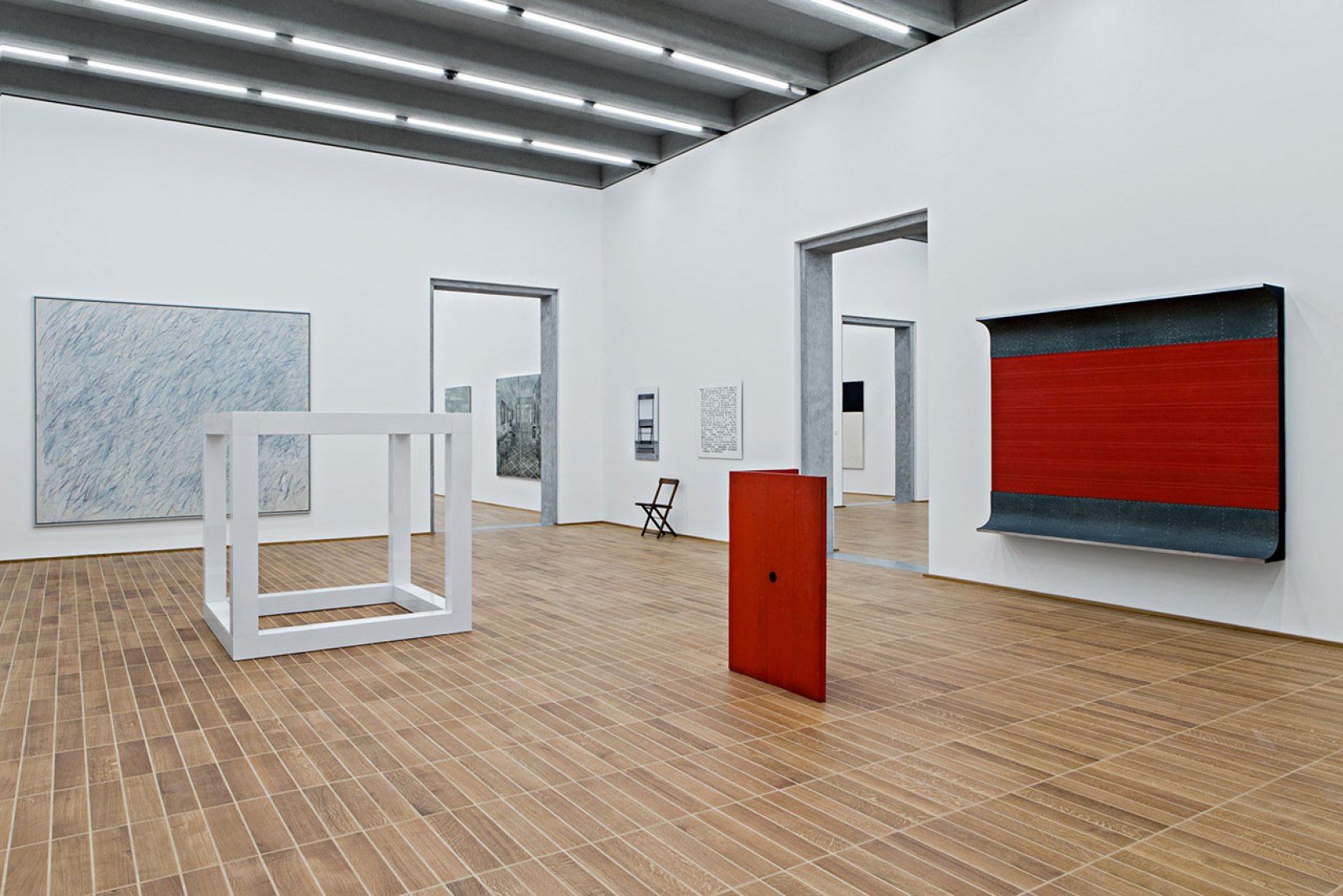 Collection presentation Kunstmuseum Basel | new building, 1. Upstairs, with works by Cy Twombly, Sol LeWitt, Joseph Kosuth, Donald Judd. Kunstmuseum Basel. Photography © Gina Folly.