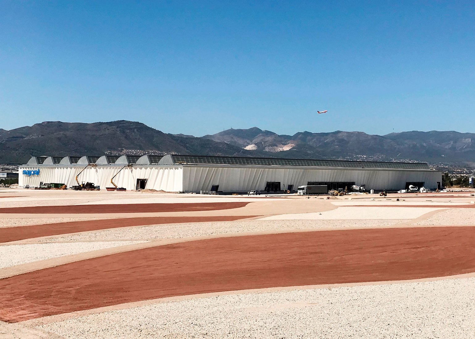 Renovation in progress, exterior view. Renovation of the Intelhorce factory in Málaga by System Arquitectura. Photography by Fernando Alda Renovation in progress, exterior view. Renovation of the Intelhorce factory in Málaga by System Arquitectura. Photography by Fernando Alda