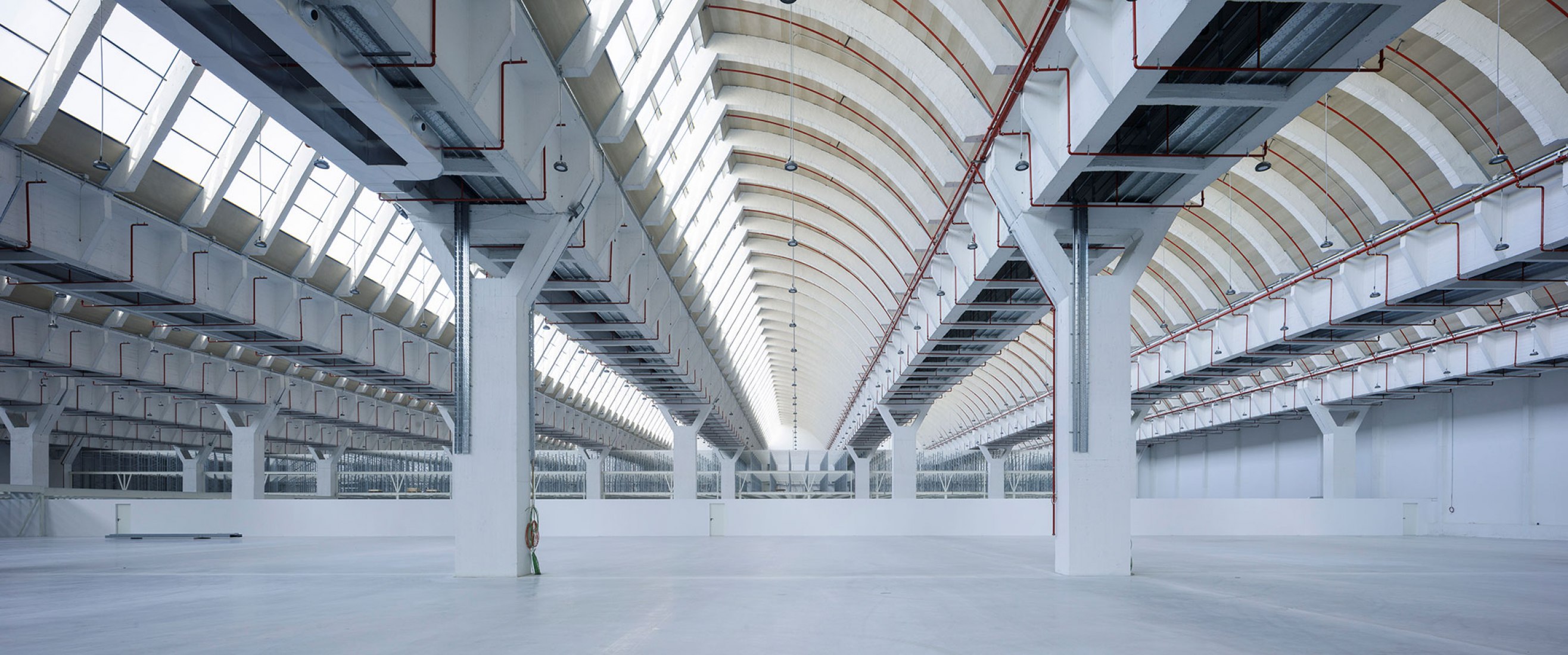 Renovation in progress, interior view. Renovation of the Intelhorce factory in Málaga by System Arquitectura. Photography by Fernando Alda Renovation in progress, interior view. Renovation of the Intelhorce factory in Málaga by System Arquitectura. Photography by Fernando Alda