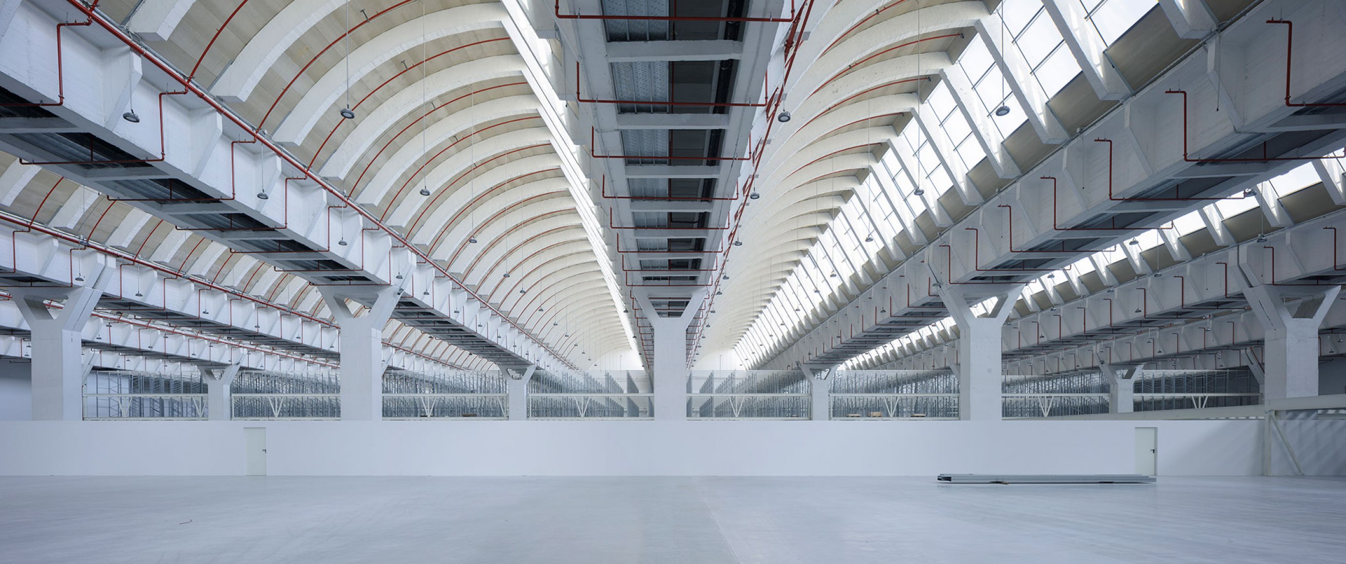 Renovation in progress, interior view. Renovation of the Intelhorce factory in Málaga by System Arquitectura. Photography by Fernando Alda Renovation in progress, interior view. Renovation of the Intelhorce factory in Málaga by System Arquitectura. Photography by Fernando Alda