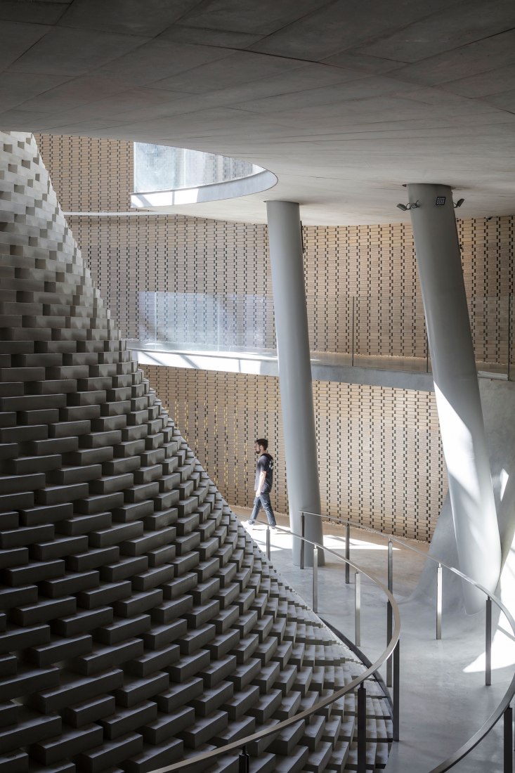 Walkways around the spiral. The Mount Herzl Memorial Hall by Kimmel Eshkolot Architects. Photograph © Amit Geron Walkways around the spiral. The Mount Herzl Memorial Hall by Kimmel Eshkolot Architects. Photograph © Amit Geron