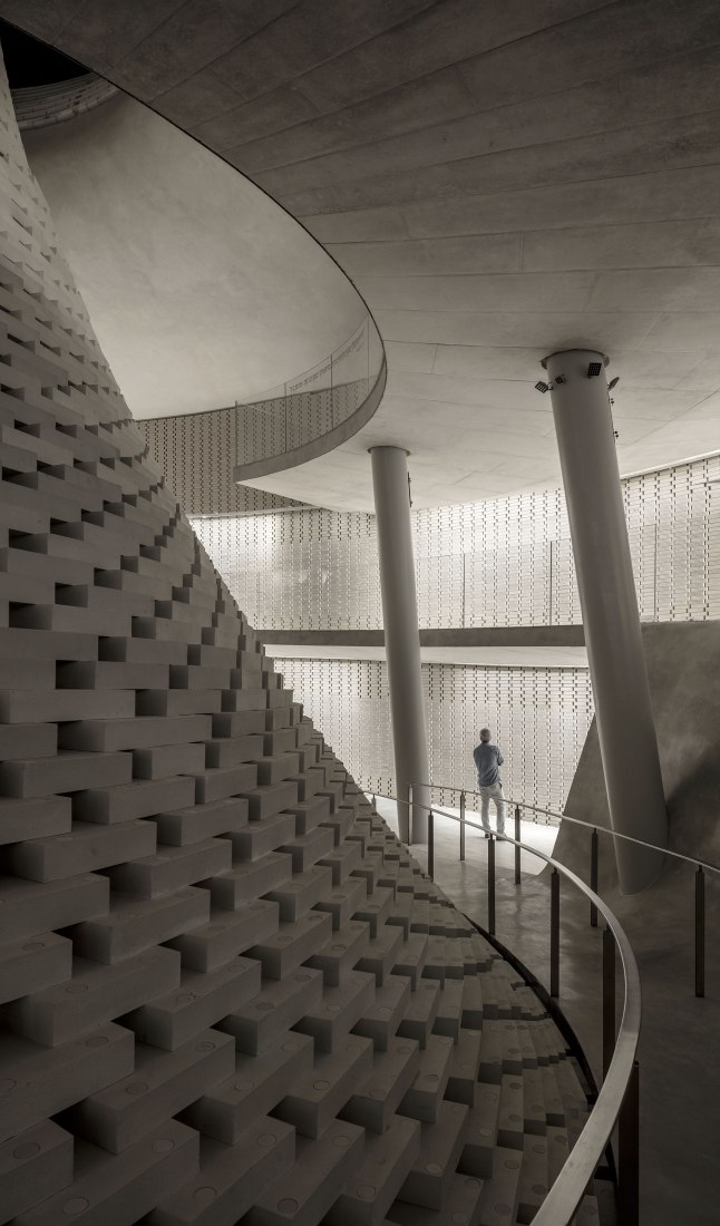 Walkways around the spiral. The Mount Herzl Memorial Hall by Kimmel Eshkolot Architects. Photograph © Amit Geron Walkways around the spiral. The Mount Herzl Memorial Hall by Kimmel Eshkolot Architects. Photograph © Amit Geron