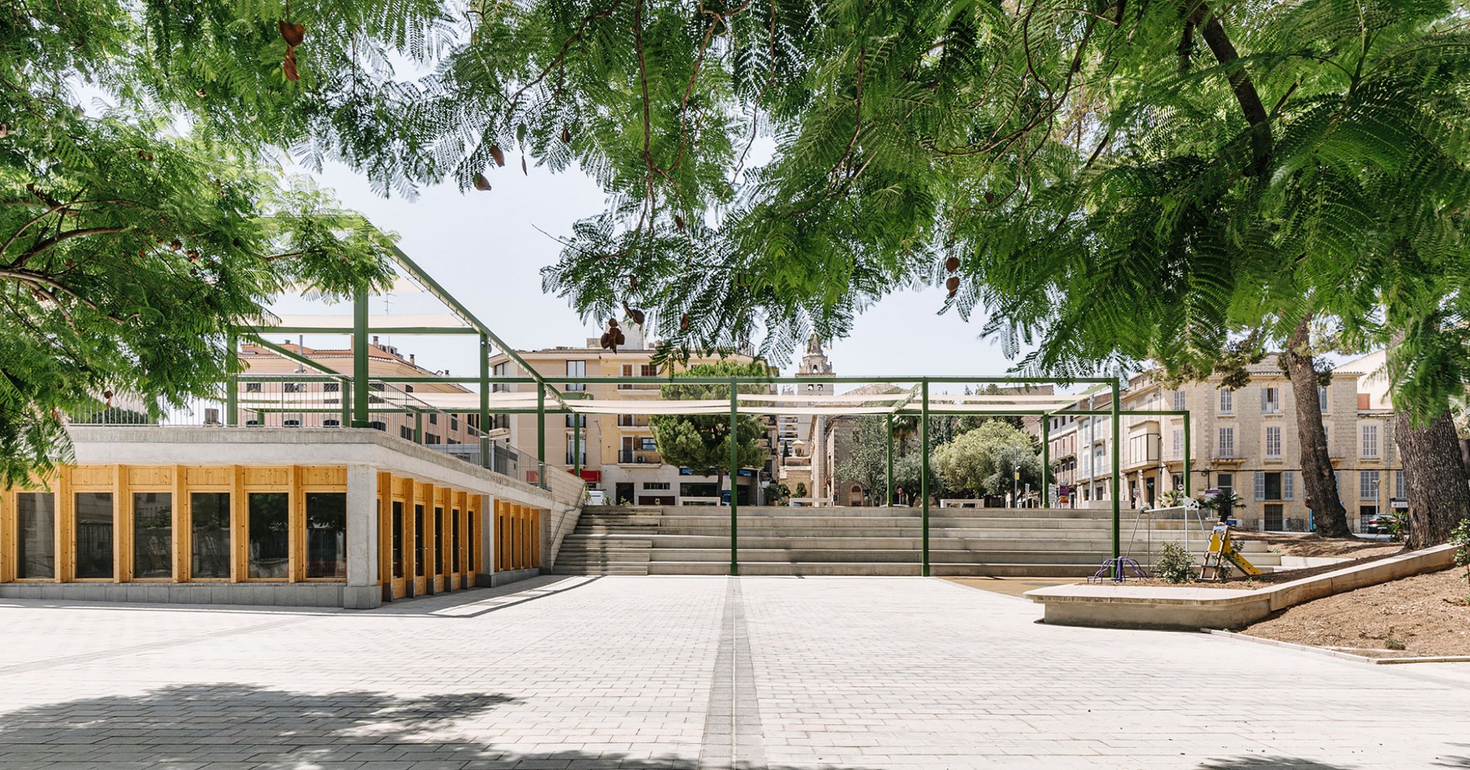 Elevation calle d'Arta 2021. Fonamental. Renovation of Plaza Mallorca by Son Estudi. Photography by Grimalt Elevation calle d'Arta 2021. Fonamental. Renovation of Plaza Mallorca by Son Estudi. Photography by Grimalt