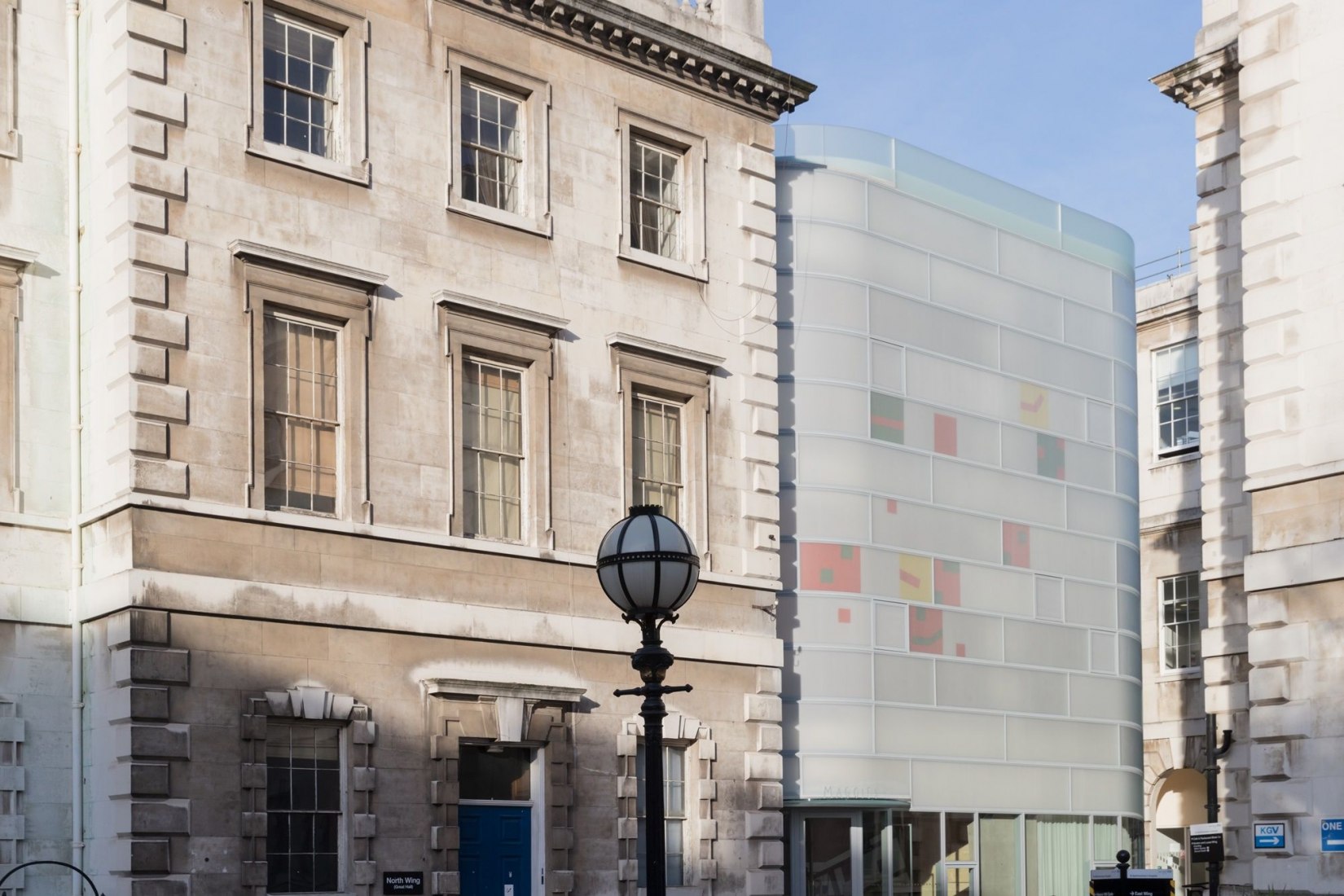 Day view. Night view. New Maggie's Centre by Steven Holl. Photograph © Iwan Baan