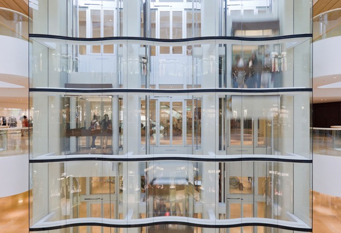 Inside view lifts. Pacific Place by Thomas Heatherwick. Photography courtesy of Heatherwick Studio.