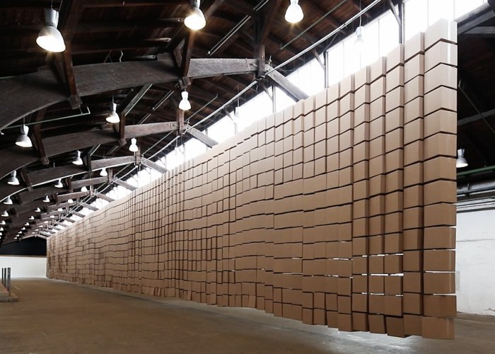 435 prepared dc-motors, 2030 cardboard boxes 35x35x35cm by Zimoun