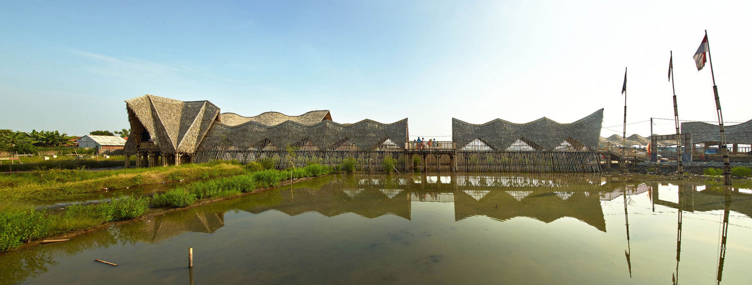 A building with bamboo and nipa s roof incorporating local